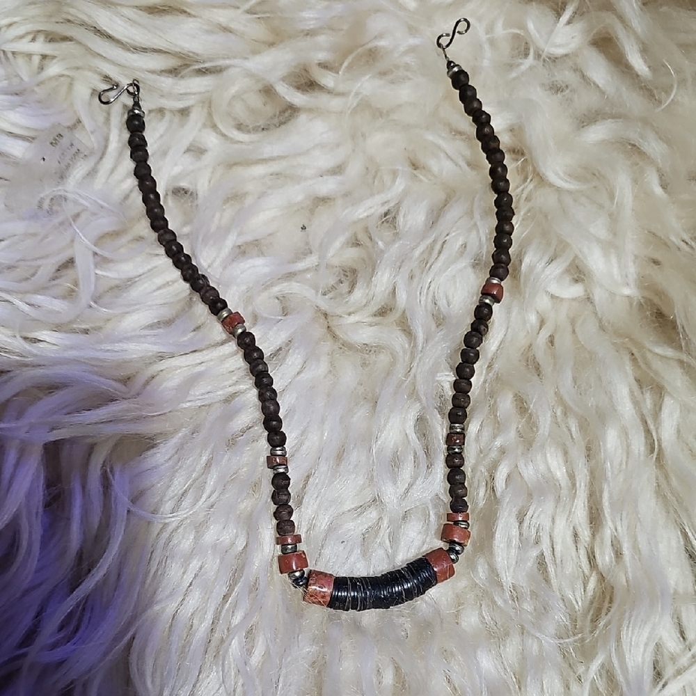 Elegant Beaded Necklace with Red Accents